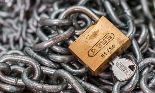 锁形图标与手机屏幕结合的安全示意图，蓝色科技感背景突出安全主题